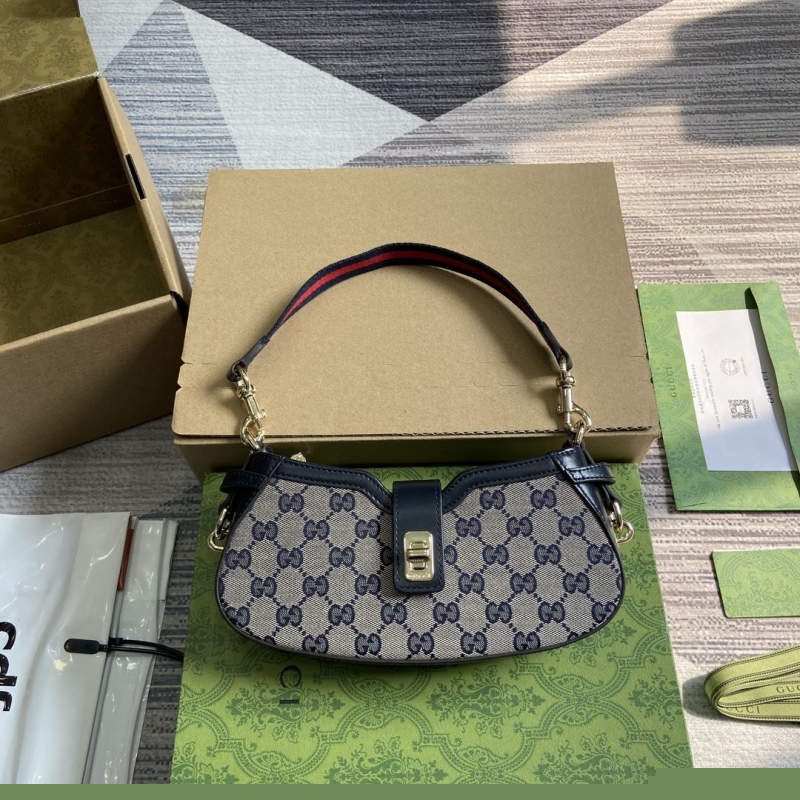 G*u*i top handle bags